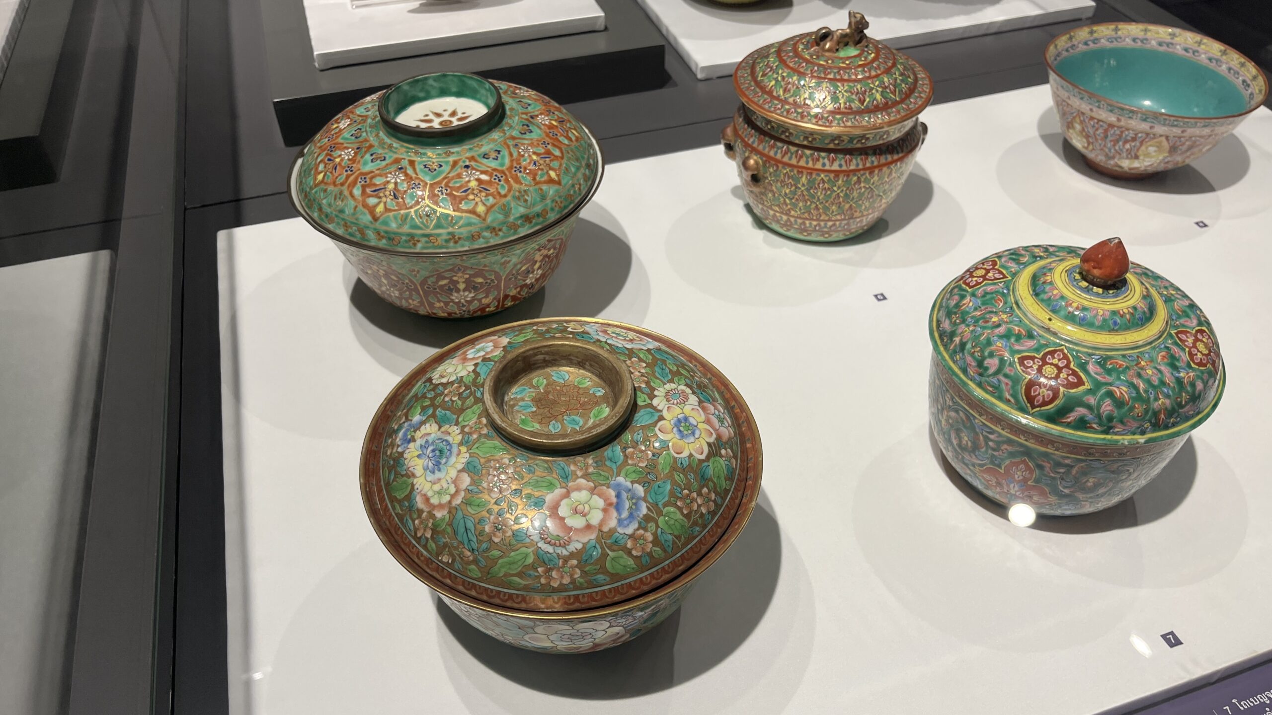 Colourful decorated bowls and containers at National Museum Bangkok